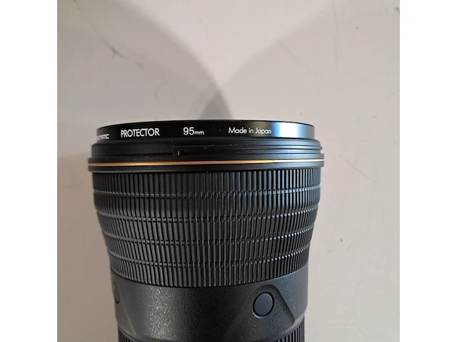 2x camera lens, nikon, o.a af-s nikkor 180-400mm 1:4e tc1.4 fl ed - afbeelding 23 van  23