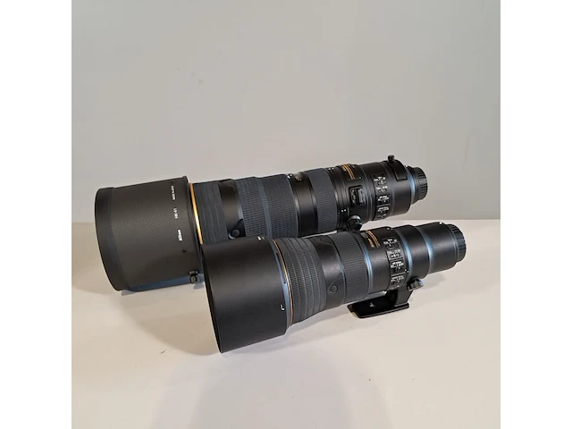2x camera lens, nikon, o.a af-s nikkor 180-400mm 1:4e tc1.4 fl ed - afbeelding 1 van  18
