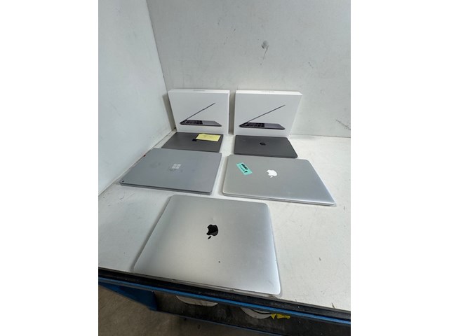 5x laptop apple en microsoft, defect/niet werkend - afbeelding 1 van  14