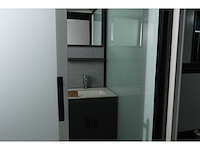 6 stuks rhino-houses 1160x250x239 cm 29 m2 mobiele woonunit / tiny house (6x) - afbeelding 29 van  42