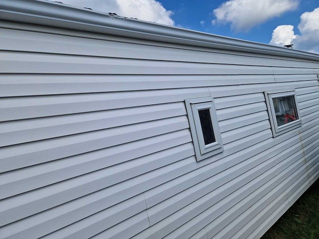 8,45x3,12x3,35 m kunststof chalet - afbeelding 18 van  23