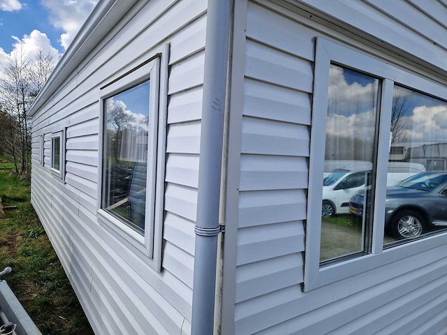8,45x3,12x3,35 m kunststof chalet - afbeelding 20 van  23