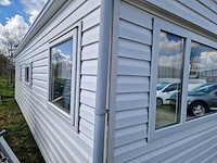 8,45x3,12x3,35 m kunststof chalet - afbeelding 20 van  23