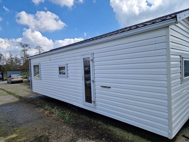 8,45x3,12x3,35 m kunststof chalet - afbeelding 33 van  33