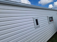 8,45x3,12x3,35 m kunststof chalet - afbeelding 20 van  25