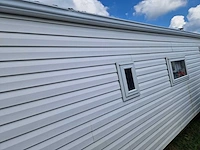8,45x3,12x3,35 m kunststof chalet - afbeelding 22 van  27