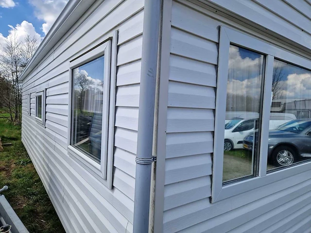 8,45x3,12x3,35 m kunststof chalet - afbeelding 24 van  27