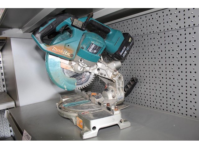 Accu afkortzaag makita 18v dls600 met 5,0ah accu. - afbeelding 2 van  3