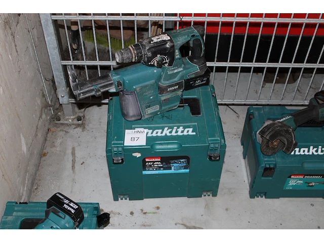 Accu boorhamer makita dhr242 met hepa dx01 afzuiger met accu en kunststoffen koffer - afbeelding 1 van  2