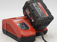 Acculader en accu, milwaukee, m12-18fc - afbeelding 1 van  6