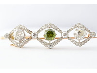 Antieke broche met old cut diamanten en zeldzame demantoiet