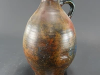Antieke redware aardewerk kruik