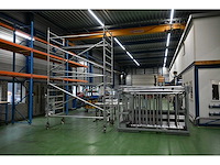 Apw aluminium rolsteiger - 11 meter werkhoogte - met gegalvaniseerde opslagbok - afbeelding 1 van  9