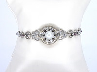 Art-deco armband met goud en platina, en natuurlijke diamanten en robijnen - afbeelding 1 van  9