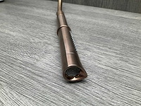 Axor starck showerporter wandhouder met staafhanddouche 2jet en doucheslang brushed red gold - afbeelding 1 van  8