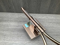 Axor starck showerporter wandhouder met staafhanddouche 2jet en doucheslang brushed red gold