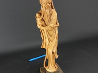 Beeld chinese wijze met kind op basement - afbeelding 2 van  5