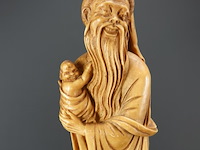 Beeld chinese wijze met kind op basement - afbeelding 3 van  5