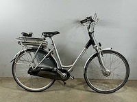 Bikkel gouden leeuw elektrische damesfiets