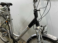 Bikkel gouden leeuw elektrische damesfiets - afbeelding 1 van  5