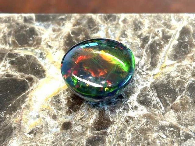 Black opal 10.20 ct - afbeelding 2 van  3