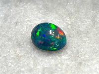 Black opal 4.41 carat natuurlijke black opal - afbeelding 1 van  4