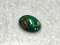 Black opal 5.56 carat natuurlijke black opal - afbeelding 1 van  4