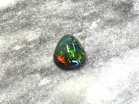 Black opal 5.60 ct