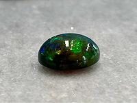 Black opal 6.73 carat natuurlijke black opal - afbeelding 1 van  4