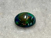 Black opal 6.73 carat natuurlijke black opal - afbeelding 2 van  4