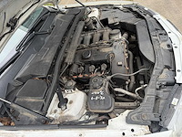 Bmw - 128i - personenauto - 2009 - afbeelding 12 van  23