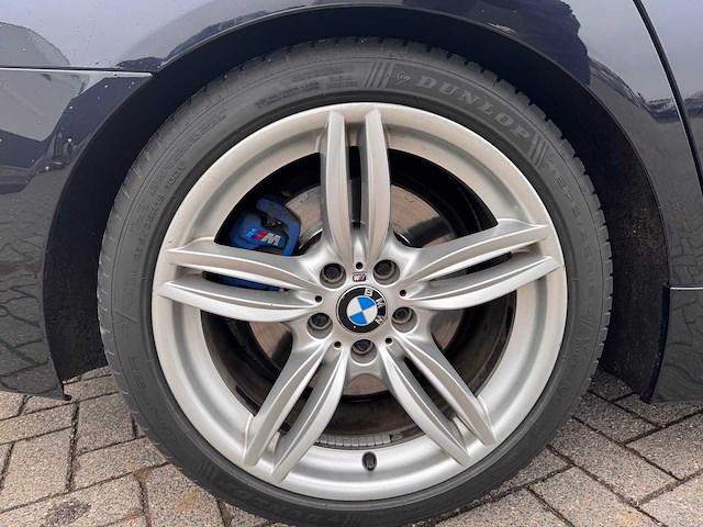 Bmw - 2011 - 5-serie - 550xi high - personenauto - afbeelding 3 van  26