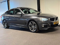 Bmw - 3-serie gran turismo - 320i high executive - 7-sxn-16 - 2014 iaw - afbeelding 23 van  27