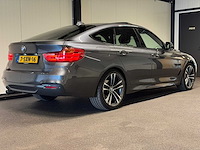 Bmw - 3-serie gran turismo - 320i high executive - 7-sxn-16 - 2014 iaw - afbeelding 25 van  27