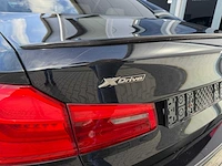 Bmw - 5-serie - m550i - xd hi exe personenauto - 2018 - afbeelding 21 van  34