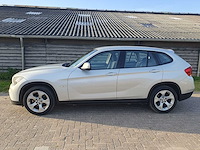 Bmw - x1 - sdrive18d executive - car - 2011 - afbeelding 7 van  14