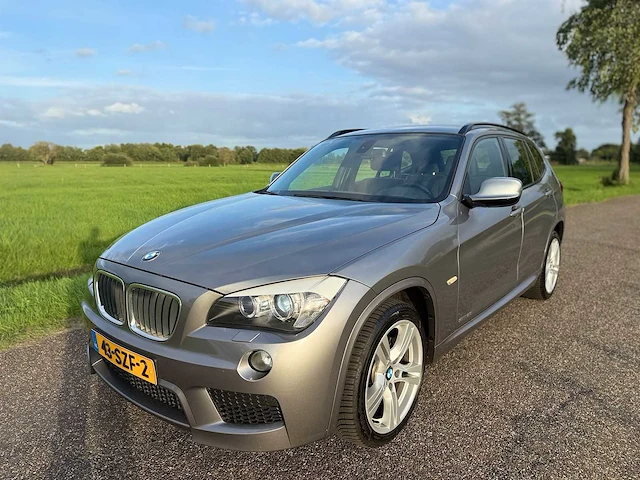 Bmw - x1 - sdrive20i business - 2011 - 43-szf-2 - personenauto - afbeelding 1 van  15
