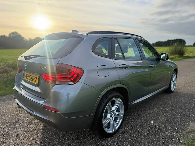 Bmw - x1 - sdrive20i business - 2011 - 43-szf-2 - personenauto - afbeelding 14 van  17