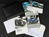 Bmw 1-serie 114i ede executive 1-szk-42 - afbeelding 27 van  33