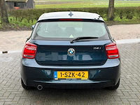 Bmw 1-serie 114i ede executive 1-szk-42 - afbeelding 28 van  33