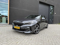 Bmw 1-serie 118i high exec ; k-375-rl, automaat - afbeelding 37 van  37