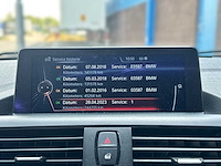 Bmw 1-serie 118i high executive 2015 | 1-znk-65 - afbeelding 24 van  32