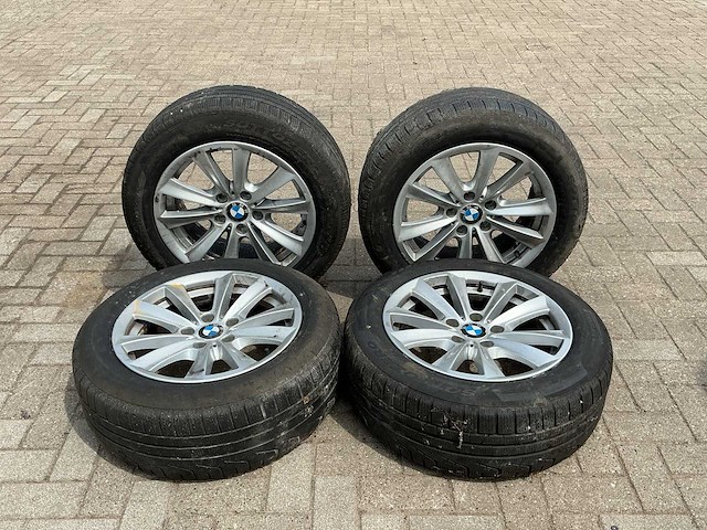 Bmw 17” velg met pirelli band - 225/55 r17 (4x) - afbeelding 1 van  7