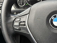 Bmw 3-serie 320i high executive | 4-txx-05 i - afbeelding 14 van  24