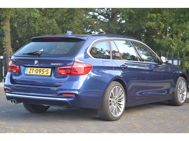 Bmw 3-serie touring 320i executive personenauto - afbeelding 34 van  49