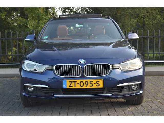 Bmw 3-serie touring 320i executive personenauto - afbeelding 45 van  49