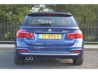Bmw 3-serie touring 320i executive personenauto - afbeelding 46 van  49