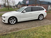 Bmw 3-serie touring 320i high executive personenauto - afbeelding 1 van  14