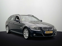 Bmw 3-serie touring 325xi high executive 2009 - afbeelding 11 van  17