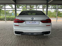 Bmw 750i xdrive | 4.4 liter v8 biturbo | 450 pk | 2015 | m-sport | bowers & wilkins | executive drive pro | head-up display | btw auto - afbeelding 34 van  37